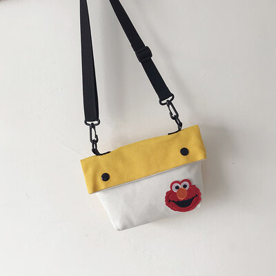 

2019 new simple&versatile fashion contrast color shoulder Messenger bag female casual cute cartoon sesame street canvas bag