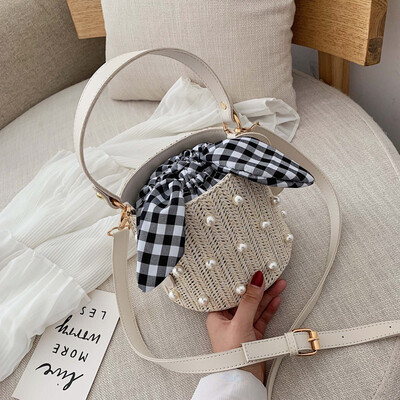 

Super fire handbags new small fresh straw pearl handbags wild small pockets Messenger bag