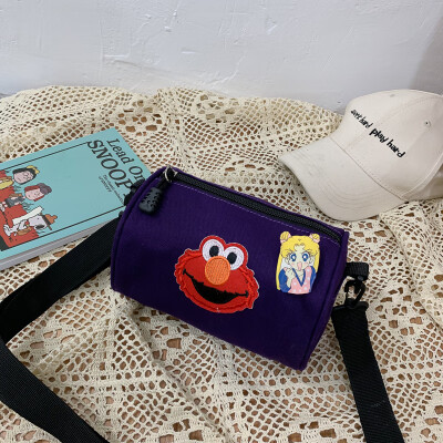 

2019 new cartoon simple versatile shoulder Messenger bag female casual fashion ugly sesame street canvas cylinder bag