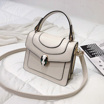 

Qiao Bani 2019 new European&American style simple star street beat snake head stitching flip bills shoulder diagonal female bag