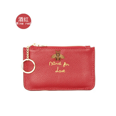 

The first layer of cowhide Europe&the United States big ladies leather short paragraph purse zipper mini lychee with ring key