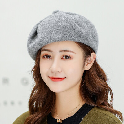 

Wholesale new autumn&winter solid-colored fur-tie lady wool knitted painter hat fashion beret