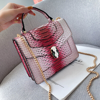 

Qiao Bani 2019 new European&American style fashion snake pattern transition color BV snake head flip cover shoulder shoulder diagonal handbag