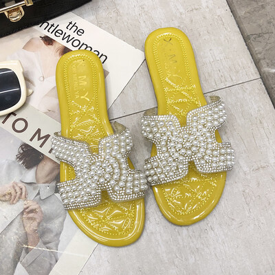 

Slipper womens summer fashion wear tide net red 2019 new Korean version of H-Pearl flat ins tide sandals toe dew