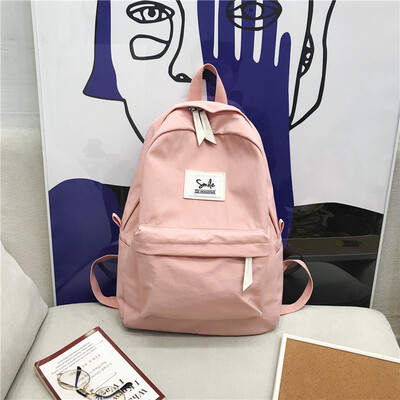 

Ancient girls school bag womens campus Korean version of high school students backpack impact color simple two - shoulder bag ins