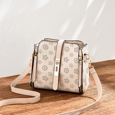 

Summer ladies go on the fashion trend with simple bucket bag on one shoulder in summer