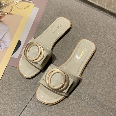 

Korean metal buckle half slippers female Xia 2019 new lazy shoes fashion 100 Korean version of wearing social women slippers