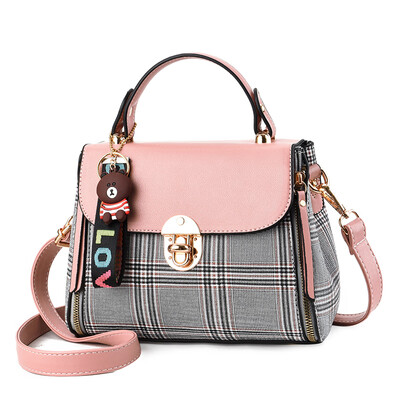 

In summer new bags of women with large capacity slung ladies stripes simple portable Korean version of Joker foreign style