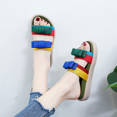 

In summer the Korean version of Joker color matching bow thick bottom slippers womens fashion wear muffin bottom word slippers