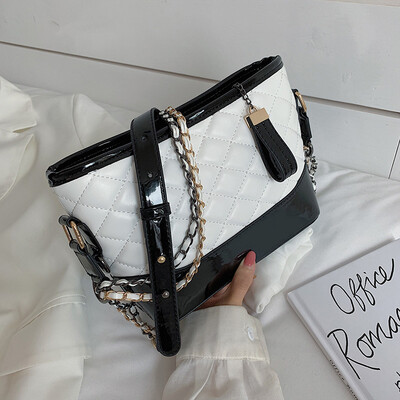 

Bag female new tide hand shoulder shoulder Korean version of the wandering bag wild embroidery line rhombic oblique chai