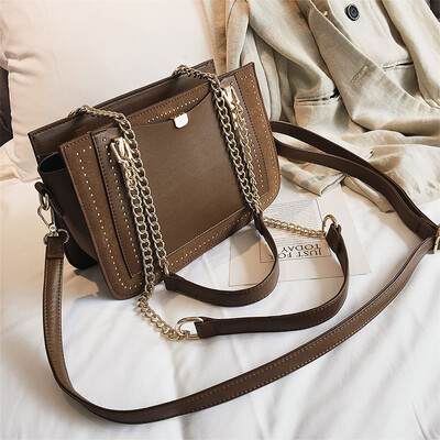 

Bag female 2019 new fashion Messenger bag tide Korean version of the simple rivet shoulder bag casual scrub chain handbags