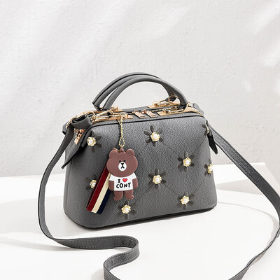

2019 spring new European&American fashion womens handbags solid color steel clip handbags foreign trade hot bags