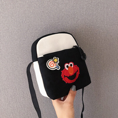 

2019 new simple&versatile fashion contrast color shoulder Messenger bag female casual cute cartoon sesame street canvas bag