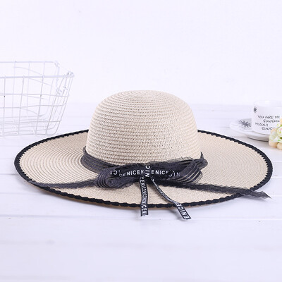 

Summer New Korean Ladys Ladys Ladys Ladys Butterfly-knotted Sun Hat Seaside Holiday Eaves Personal Sunshade Beach Hat