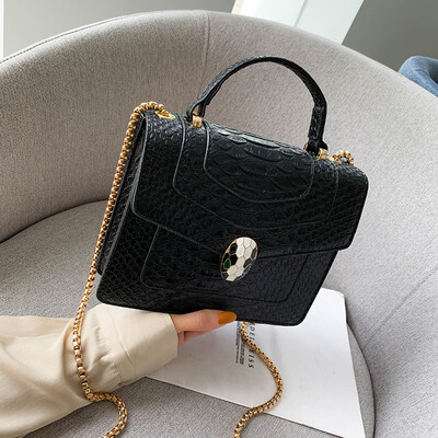 

Qiao Bani 2019 new European&American style fashion snake pattern transition color BV snake head flip cover shoulder shoulder diagonal handbag