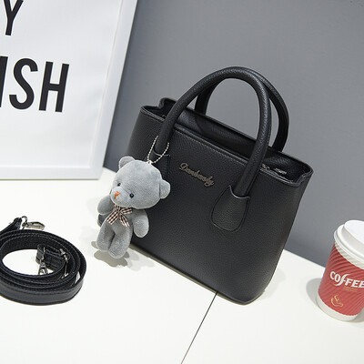 

New Korean version shoulder bag women handbags simple fashion flap bear ornaments woman messenger bag Free shipping