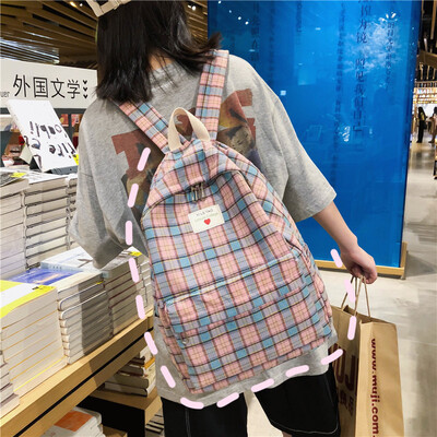 

Schoolbag female ins wind Korean college students backpack high school sen department ancient sense sen department grid Joker back