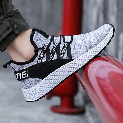 

2019 summer new Korean version of the trend of breathable student canvas shoes boys sports&leisure running shoes flying woven shoes