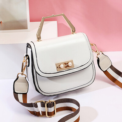 

Summer womens new Korean version of the fashion trendy small round bag impact color oblique satchel