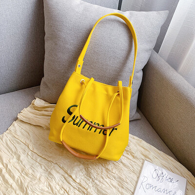 

Summer new casual bag female 2019 new Korean fashion letters canvas bag wild single shoulder slung bucket bag