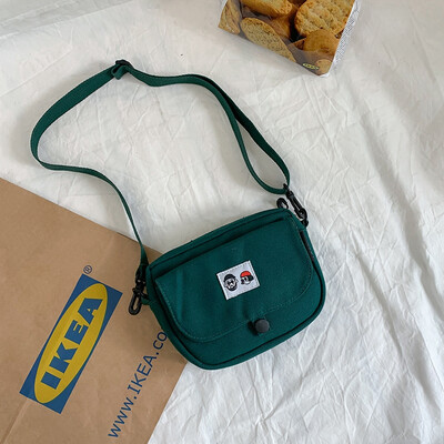 

Canvas bag woman single shoulder oblique satchel student day department original home ulzzang Korean version of the ancient girl i