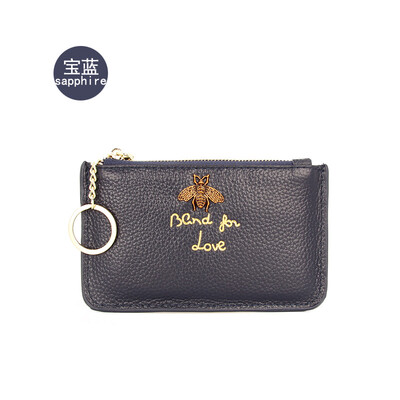 

The first layer of cowhide Europe&the United States big ladies leather short paragraph purse zipper mini lychee with ring key