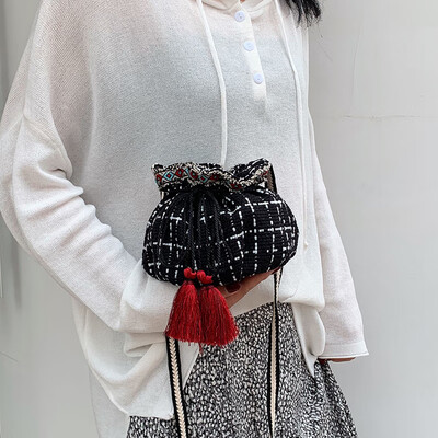 

Fringe bucket bag female 2019 new Korean version of the tide wild mini diagonal cross bag linen striped ethnic wind shoulder bag