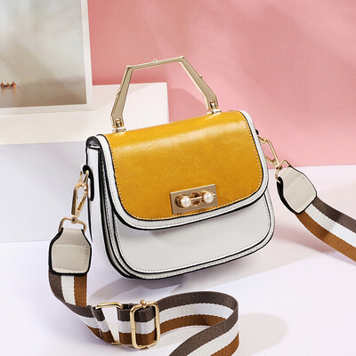 

Summer womens new Korean version of the fashion trendy small round bag impact color oblique satchel