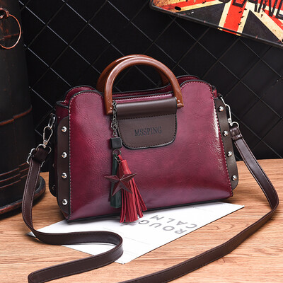 

Womens fashion chic retro European&American atmosphere portable bag Joker shoulder bag slung bag