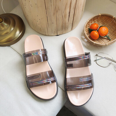 

Flat-soled transparent slippers in summer