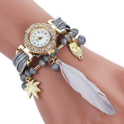 

Fashion DIY Feather Pattern Women Dress Watches Weave Montre Femme Gold Leaf Owl Pendant Rhinestone Wristwatch Bracelet Jewelry Ro