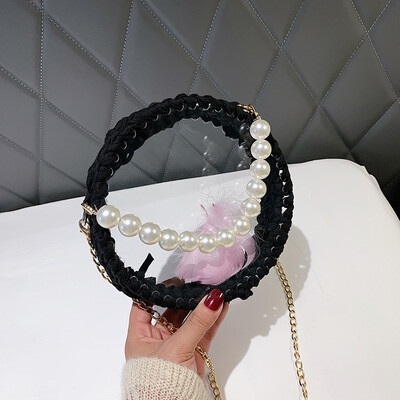 

2019 new woven round pearl handbag female chic wild chain cosmetic bag personalized transparent Messenger bag