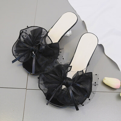 

Summer transparent slipper women wear the Korean version of fashion wave point fairy wind bow a drag with cool drag