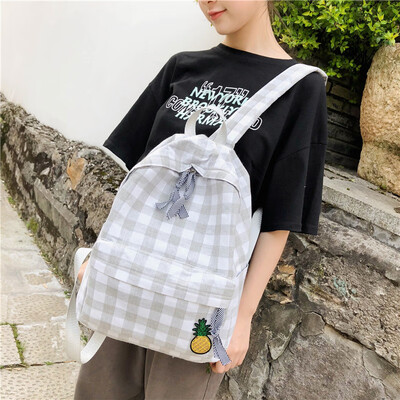 

Girl plaid schoolbag female Korean version of high school students campus small fresh backpack double shoulder bag girl