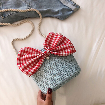

2019 new casual simple woven bucket bag female fashion wild cute bow temperament shoulder Messenger bag