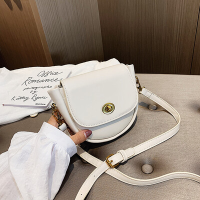 

Qiao Bani 2019 new South Korea ins fashion solid color simple lock saddle bag wild single shoulder diagonal handbag