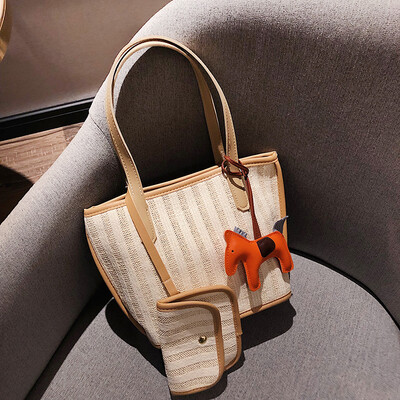 

Wild striped knit mother bucket shoulder bag female 2019 new wave Korean version of the senior sense of the ocean handbag