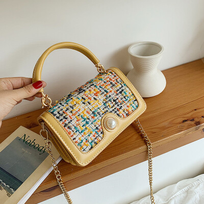 

Qiao Bani 2019 new South Korea Dongdaemun ins fashion contrast color flip bag hand strap shoulder diagonal tide handbag