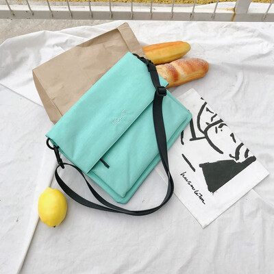 

Slantbag male&female couple personality fashion canvas mens bag student small backpack travel tide one-shoulder bag