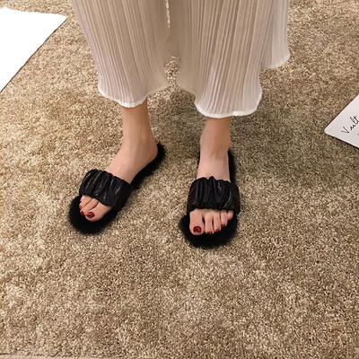 

Fairy wind sandals slippers women wear summer Korean version of open-toed flat bottom word drag fashion hairy shoes tide