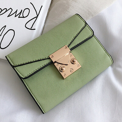 

Hong Kong fashion small wallet female short personality retro folding wallet multi-card buckle change card bag