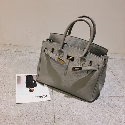 

Qiao Bani 2019 new European&American style fashion best selling lychee silk scarf platinum bag hand shoulder diagonal female bag