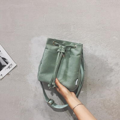 

Net red bucket small bag female 2019 new wave Korean version of the ocean shoulder bag texture fashion canvas slung small square bag