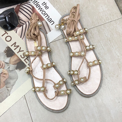 

Korean Pearl Tourist Sandals Female Flat Bottom Thai Holiday Student Toe-clipping Fire Roman Sandals Female