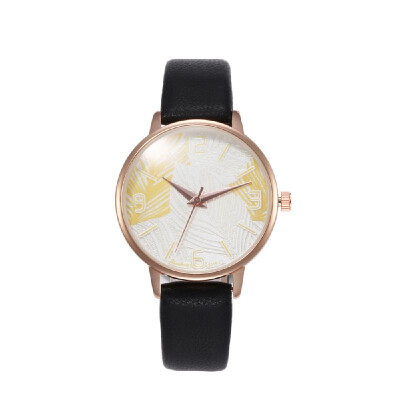 

Women Fashion Exquisite Feather Pattern Dial Leather Band Alloy Case Quartz Wrist Watch