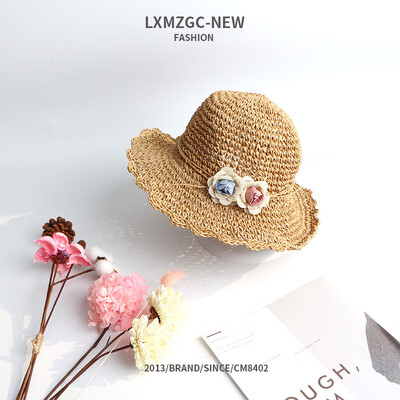 

New parent-child straw hat in summer 2019 seaside beach holiday girl sunshade cap childrens flowers sunscreen sun hat