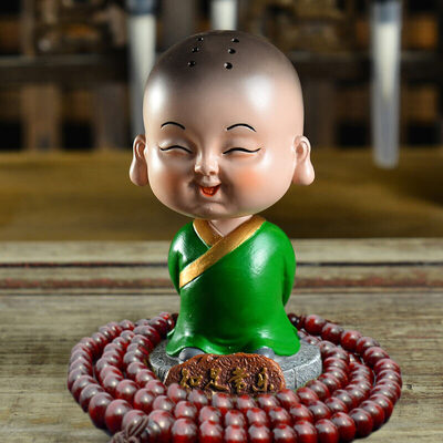 

Guangshunfa creative car decoration car decoration office decoration car ornaments shaking head small monk car ornaments cartoon car decoration products wish to become