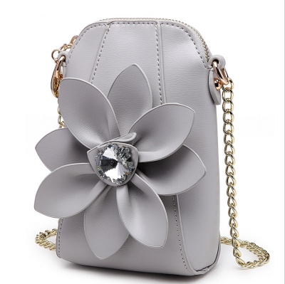 

2018 New Mini Handbag for handset A chain of water drill flowers bump a single shoulder&slung a zero Purse