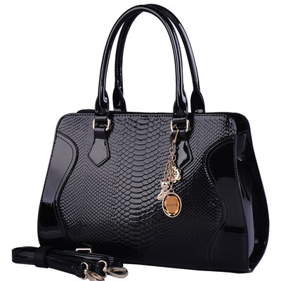 

Gold fox FOXER relief type serpentine elegant female bag leather hand messenger bag 926012F1A black