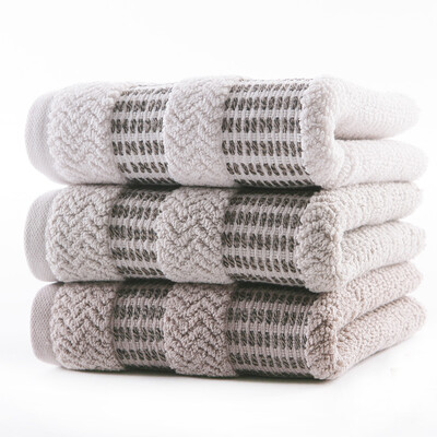 

Gold towel home textiles pure cotton plain satin towel soft water three loaded brown 148g Article 70 34cm